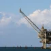 Stocks fall, oil prices spike after Iran strikes